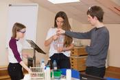 Moritz Malischewski and pupils  in chemical experiments