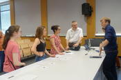 Matthew Hopkinson in conversation with students of the summer university